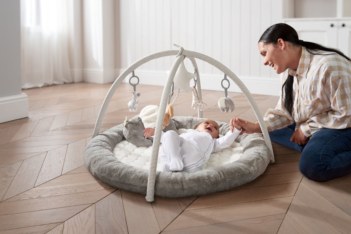 Can a baby safely sleep on a playmat?